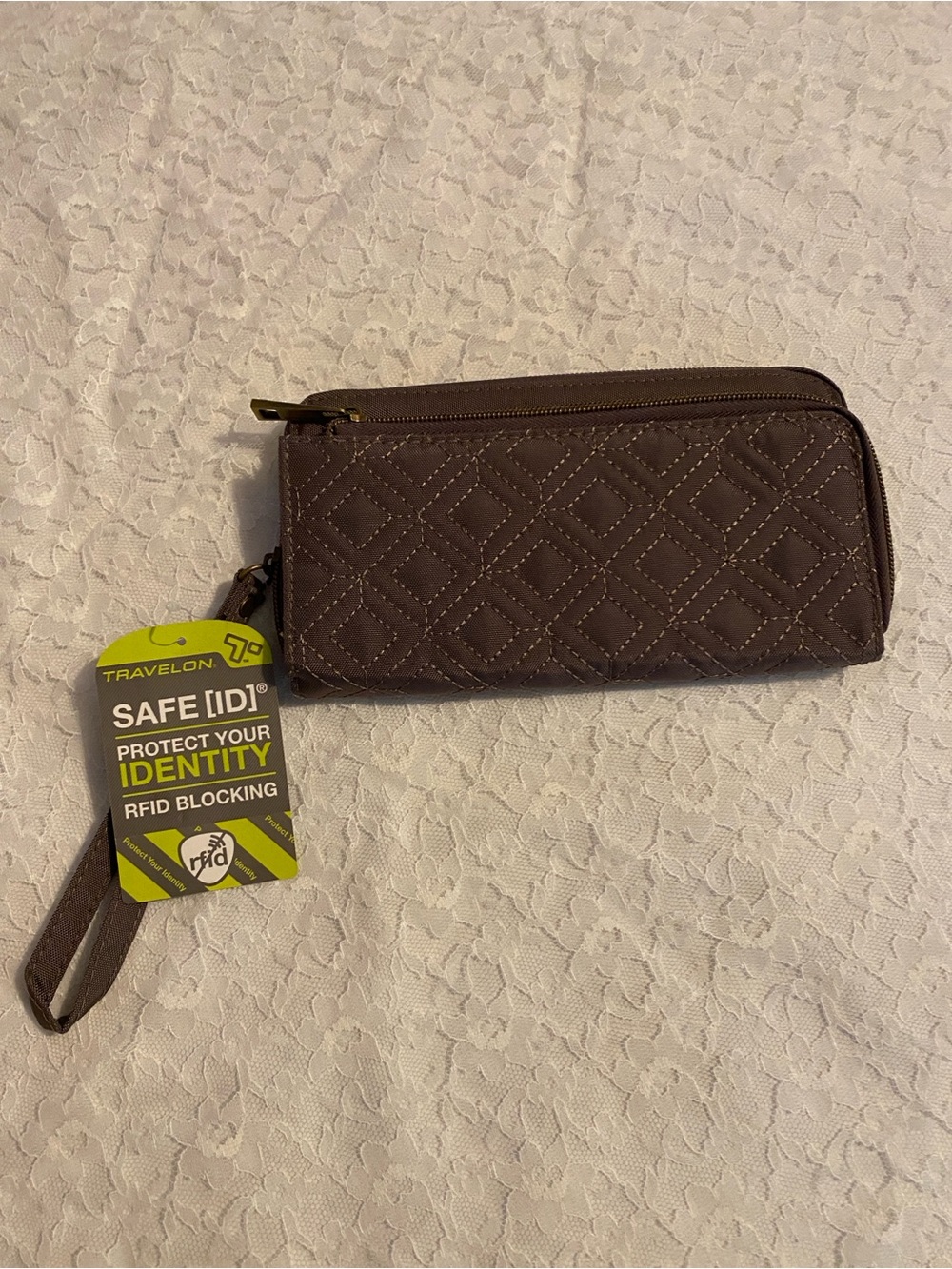 Travelon quilted Wristlet Wallet -RFID blocking to protect cards and ID.